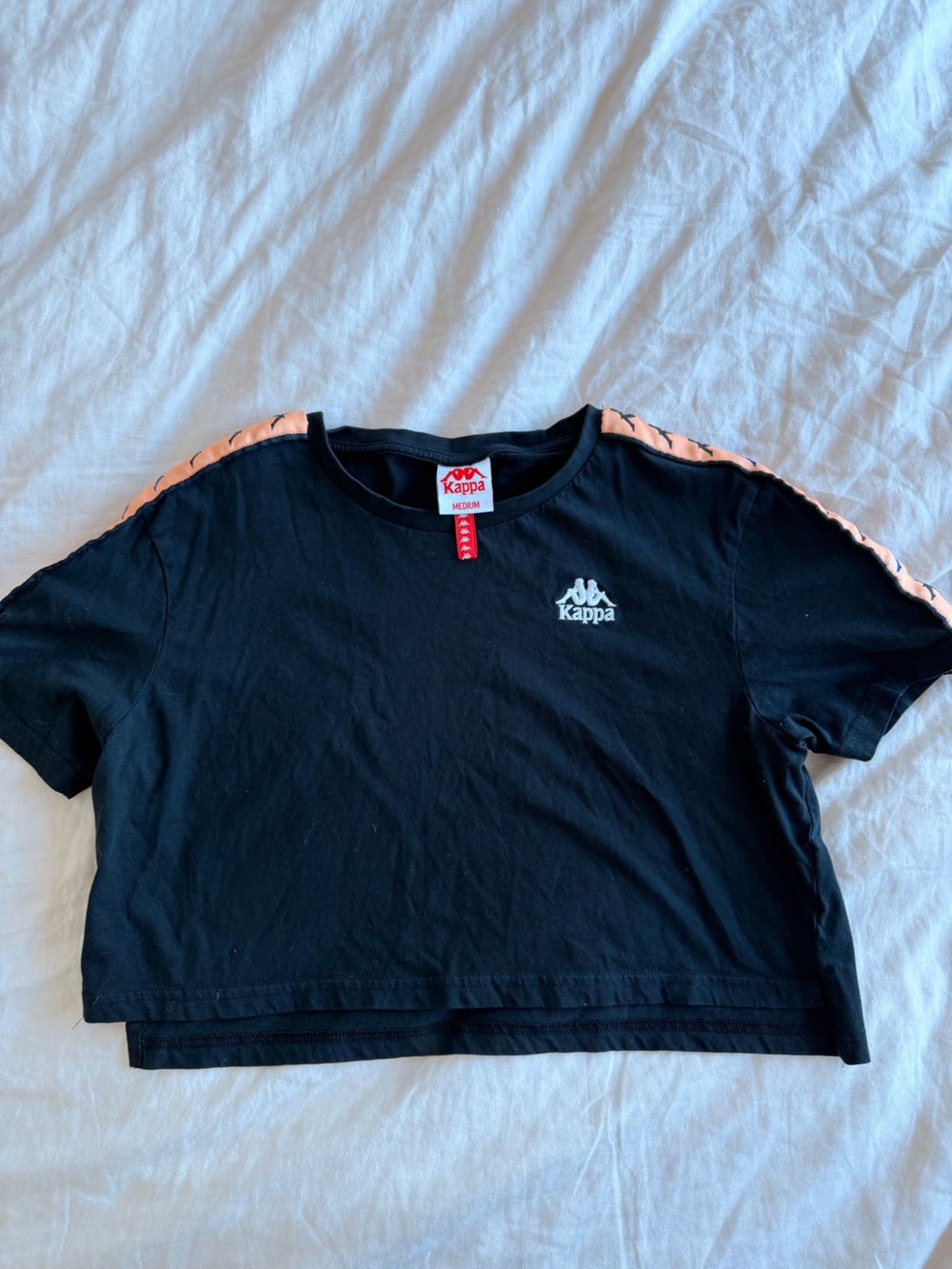 Kappa women’s Black Crop Tee with Pink Shoulder Stripe